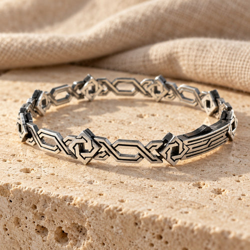 Armenian ornament bracelet in sterling silver on travertine stone