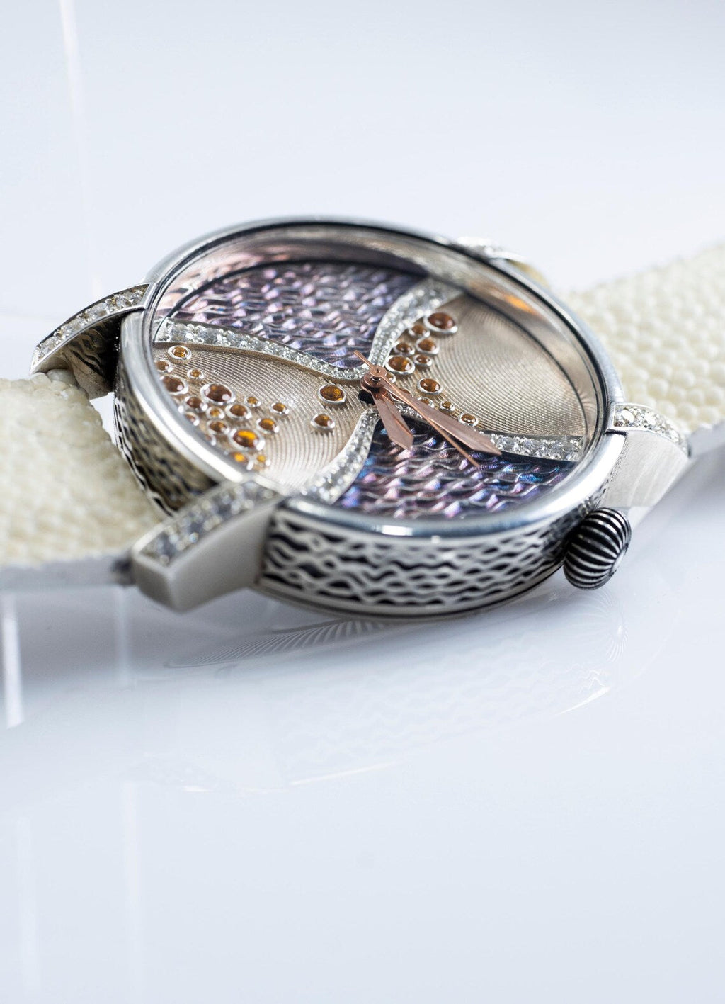 Women's sterling silver watch with guilloché dial and cream stingray strap