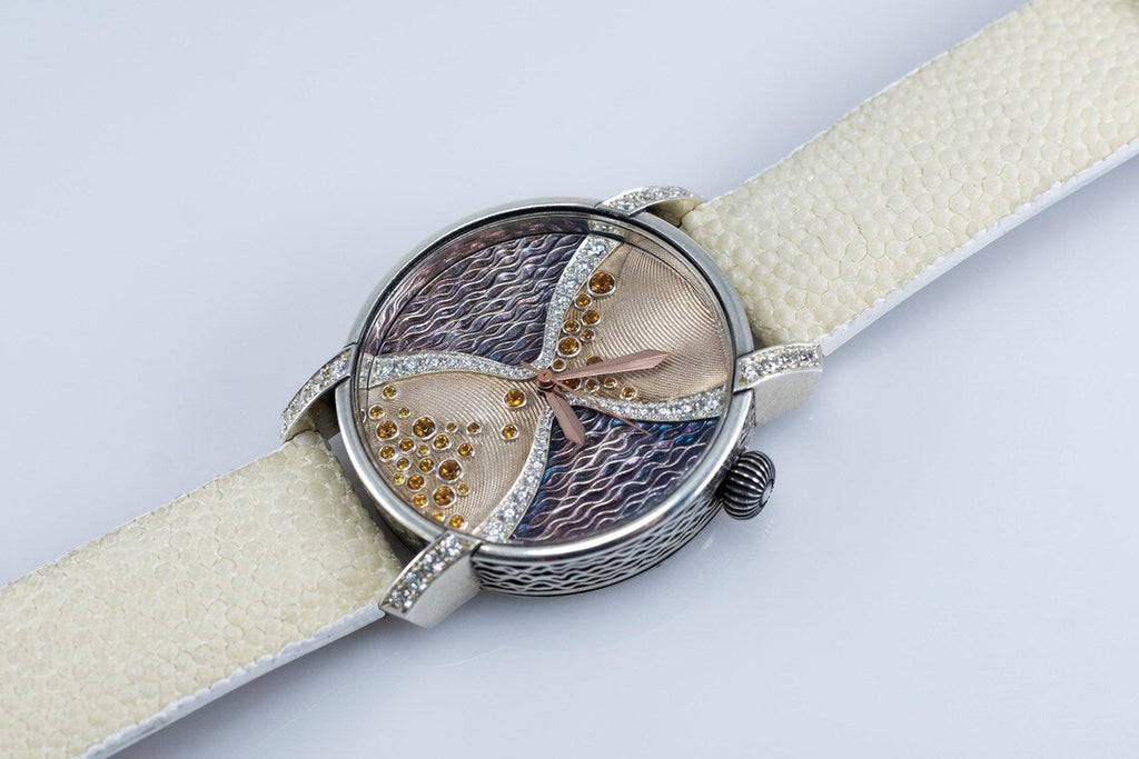 Guilloché watch dial with cubic zirconia, side view of the woven silver case
